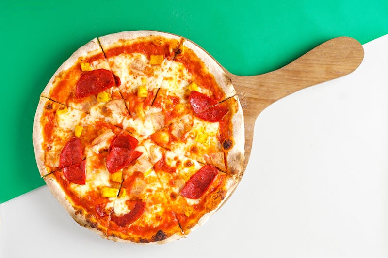 Fresh pizza being prepared for catering